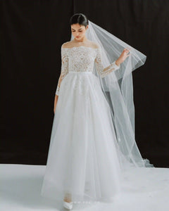 Elegant off-the-shoulder wedding dress with flared skirt and long sleeves - D1746 - POXI